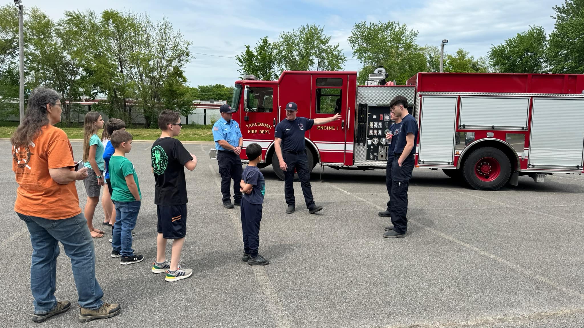 Tahlequah Fire Department Public Education - Firefighters with students
