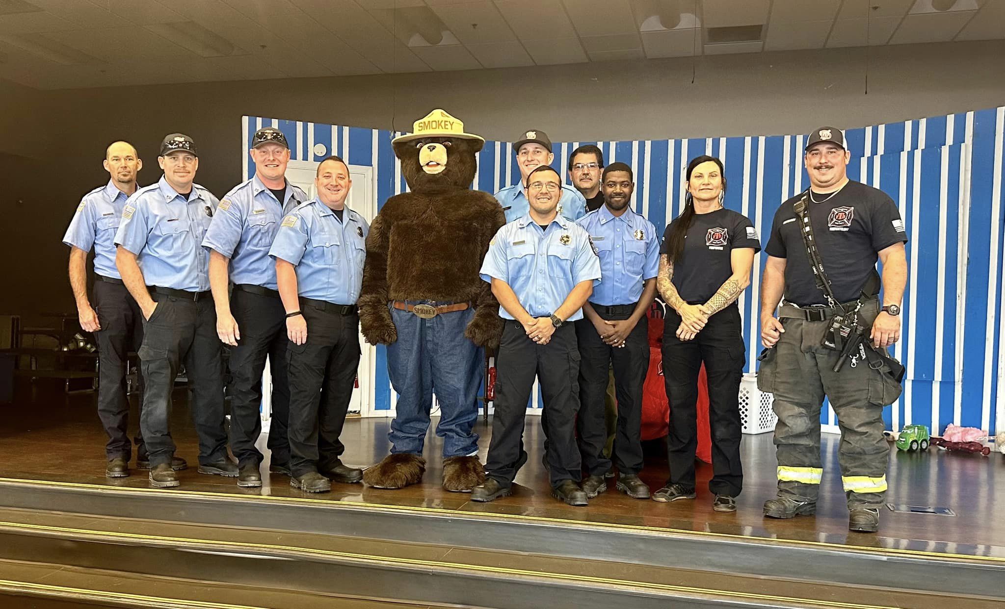 Tahlequah Fire Department Public Education - Firefighters with students